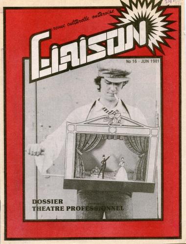 Page couverture d’un document imprimé, en français. Au centre de la page, une photographie en noir et blanc d’un homme d’âge moyen, portant autour du cou un théâtre miniature à manivelle. Sur fond rouge, le titre de la revue est écrit en grosses lettres, auxquelles se greffe un soleil stylisé.